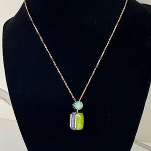 SWAROVSKI Elegant Gold Necklace with Green and Purple Pendant. Oroita Collection